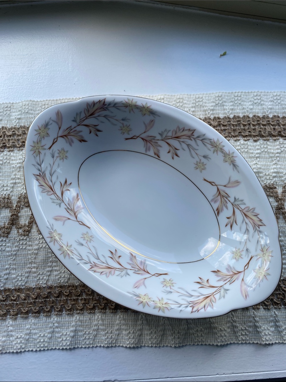 White Porcelain Serving Bowl with Pink Floral Motif and Gold Trim